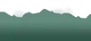 Mountain range with mist around it